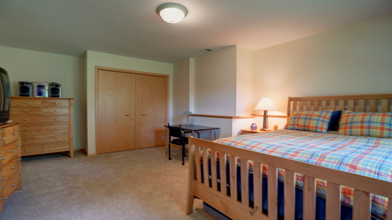 These massive lower-level bedrooms offer incredible privacy and scale for long-term guests or multi-generational living setups.