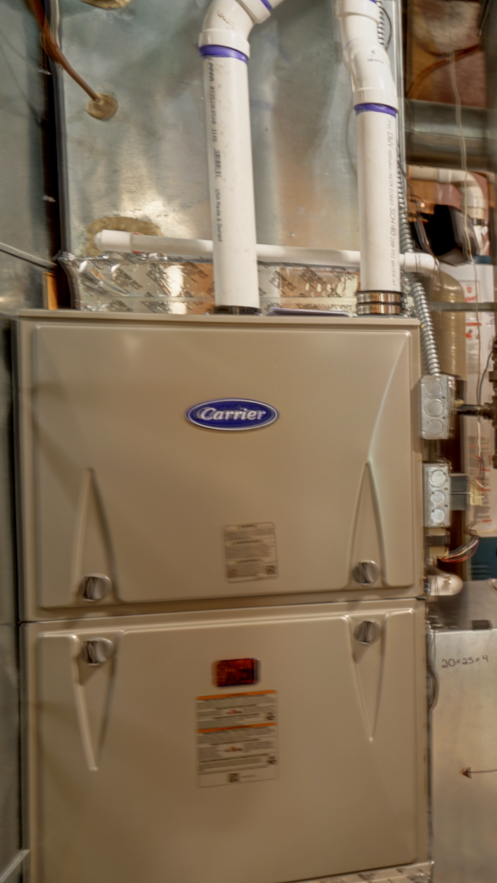 The separate 16x16 utility room houses the new high-efficiency Carrier furnace, 200 Amp panel, and zone-controlled heating system.