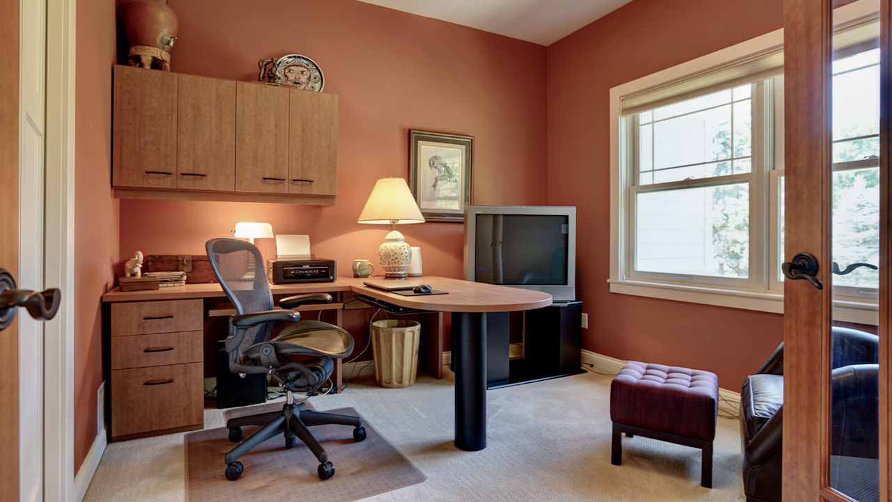 Positioned directly off the entryway, the 11x11 front study offers privacy doors and an integrated closet, ideal for a quiet home office.Natural light pours in, highlighting the clean trim lines & offering a peaceful view of the landscaped front yard