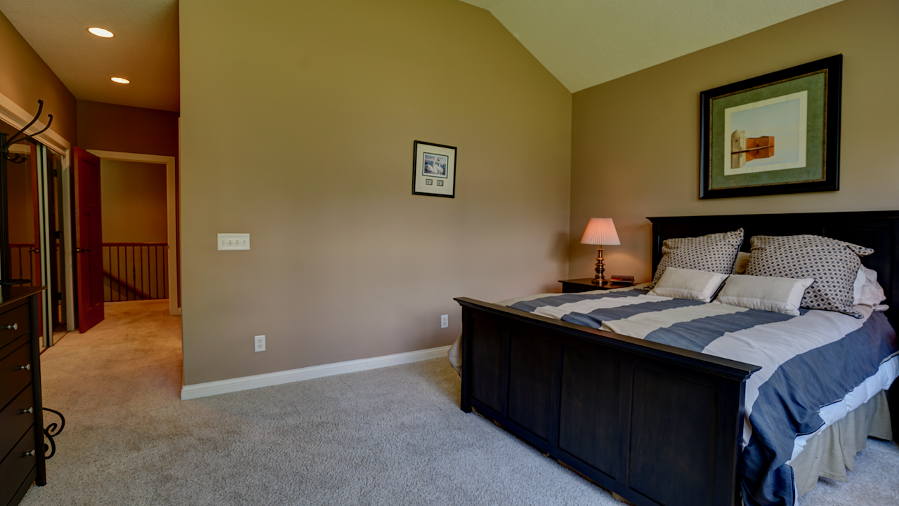 Wake up to incredible natural light and absolute quiet, buffered from the rest of the home for maximum privacy.