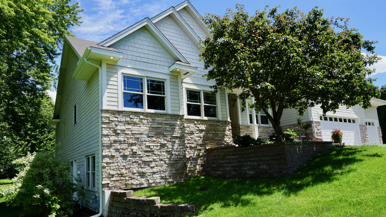 Beautiful terraces and a view of the side entrance to the lower level.