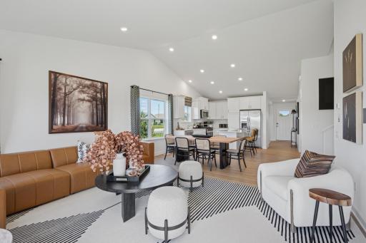 *Photo of model home, actual features may vary. The main level seamlessly transitions from room to room while maintaining an open-concept layout throughout.