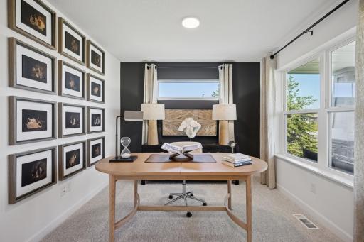 *Photo of model home, actual features may vary. Located just off the foyer, this main-level flex room provides endless opportunities, including a home office, formal dining area, an extra playroom, or another sitting room.