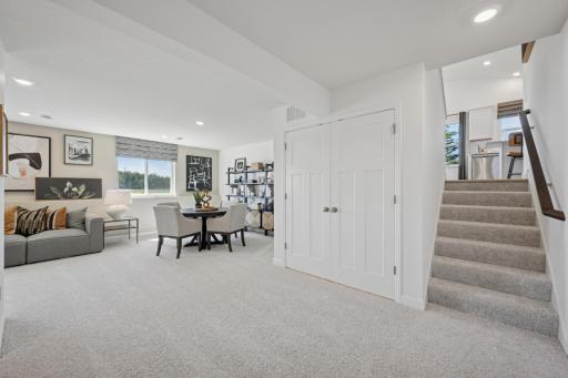 *Photo of model home, actual features may vary. The stairs lead to the finished lower level.