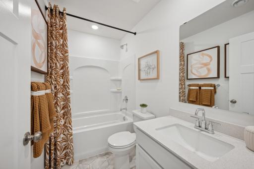 *Photo of model home, actual features may vary. Lower-level bath.