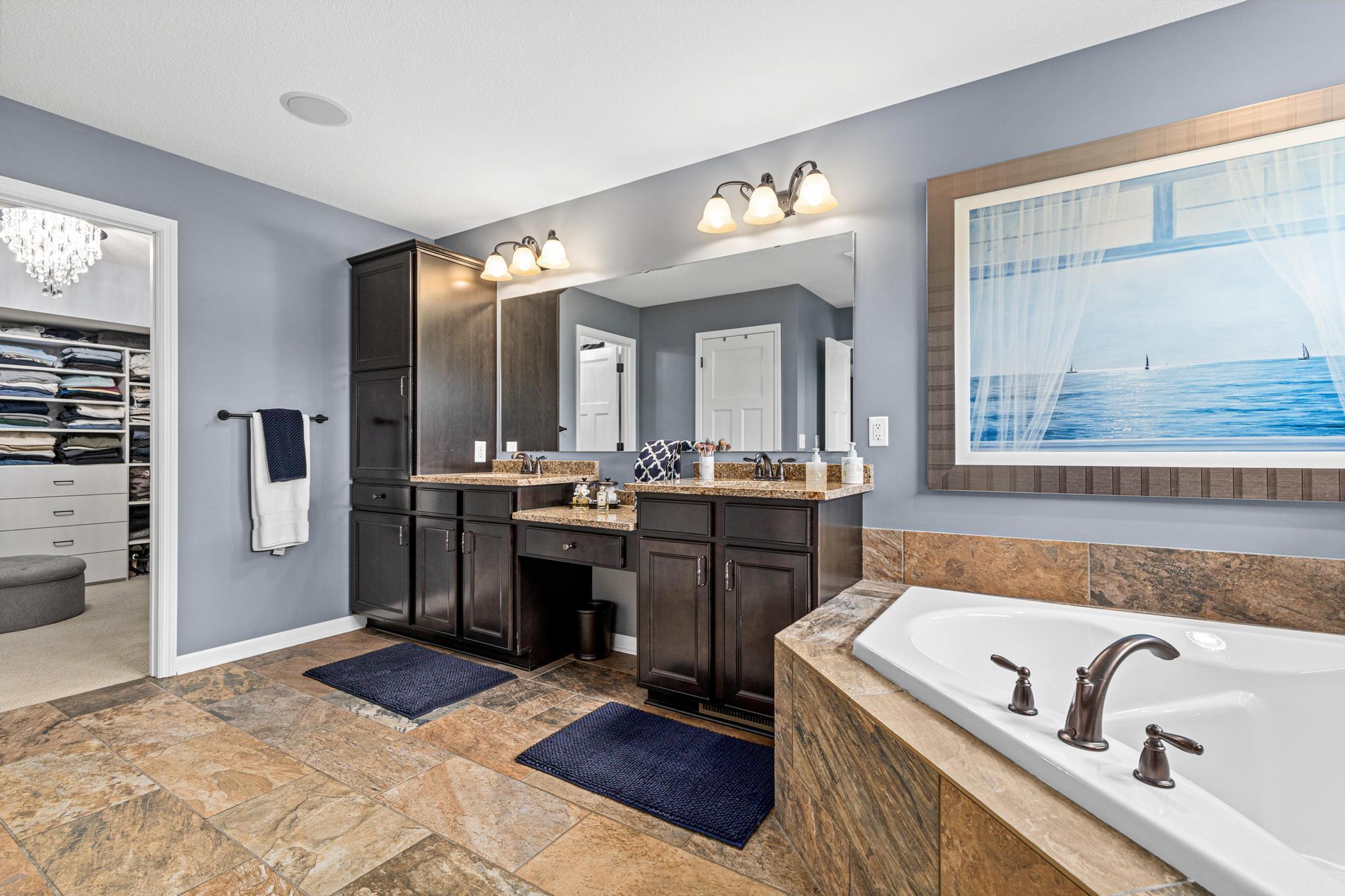 Dual vanity with makeup station.