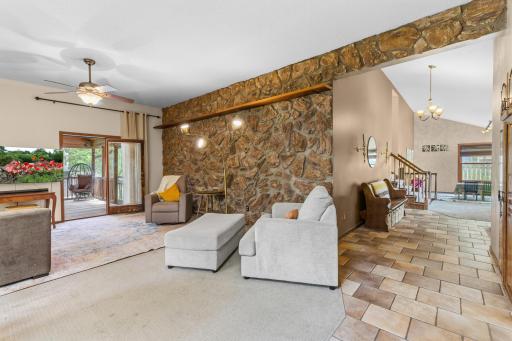 Main level family room walks out to the screen-in porch.
