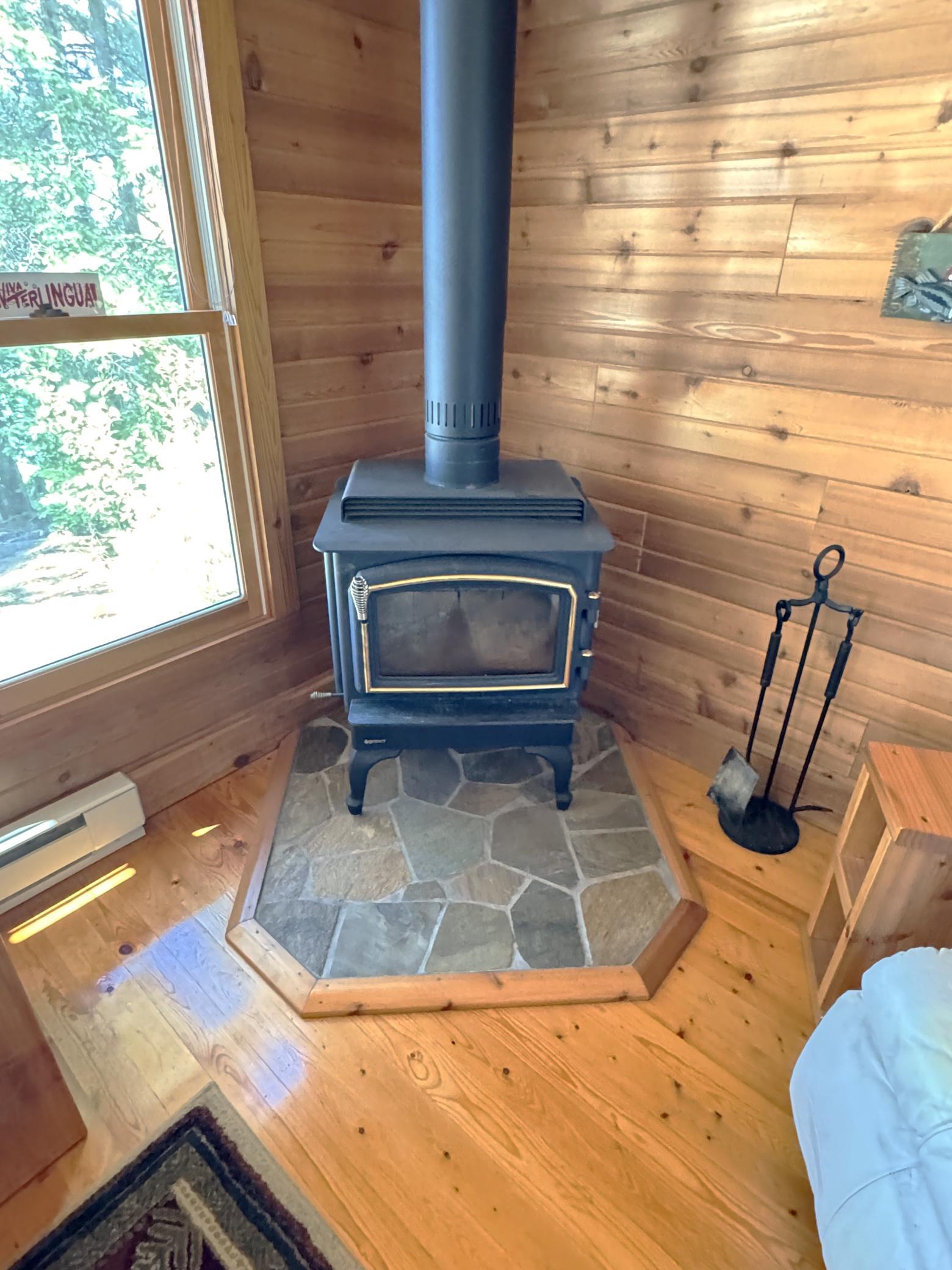Wood stove is located right in the living room.