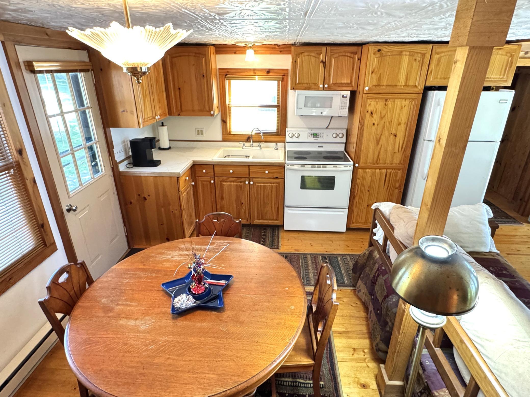 Dining area is right off the kitchen. A great place for entertaining when you have family or friends for a weekend.,