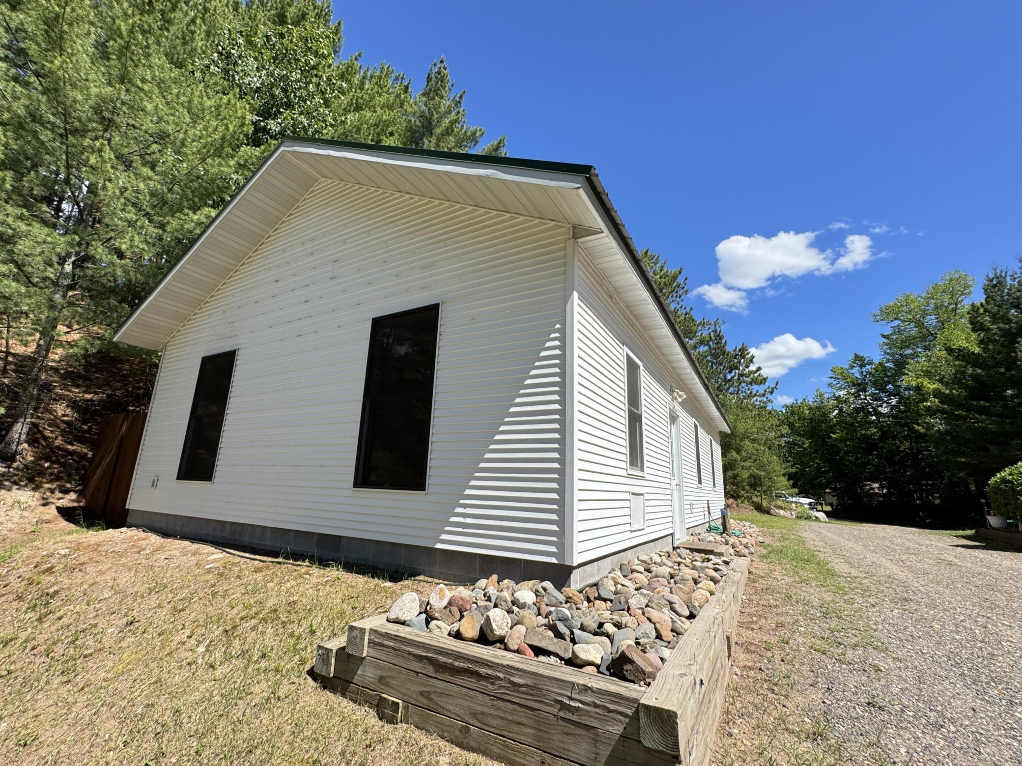 This garage is 40x24 with part of it being used for some additional sleeping spaces for guests.