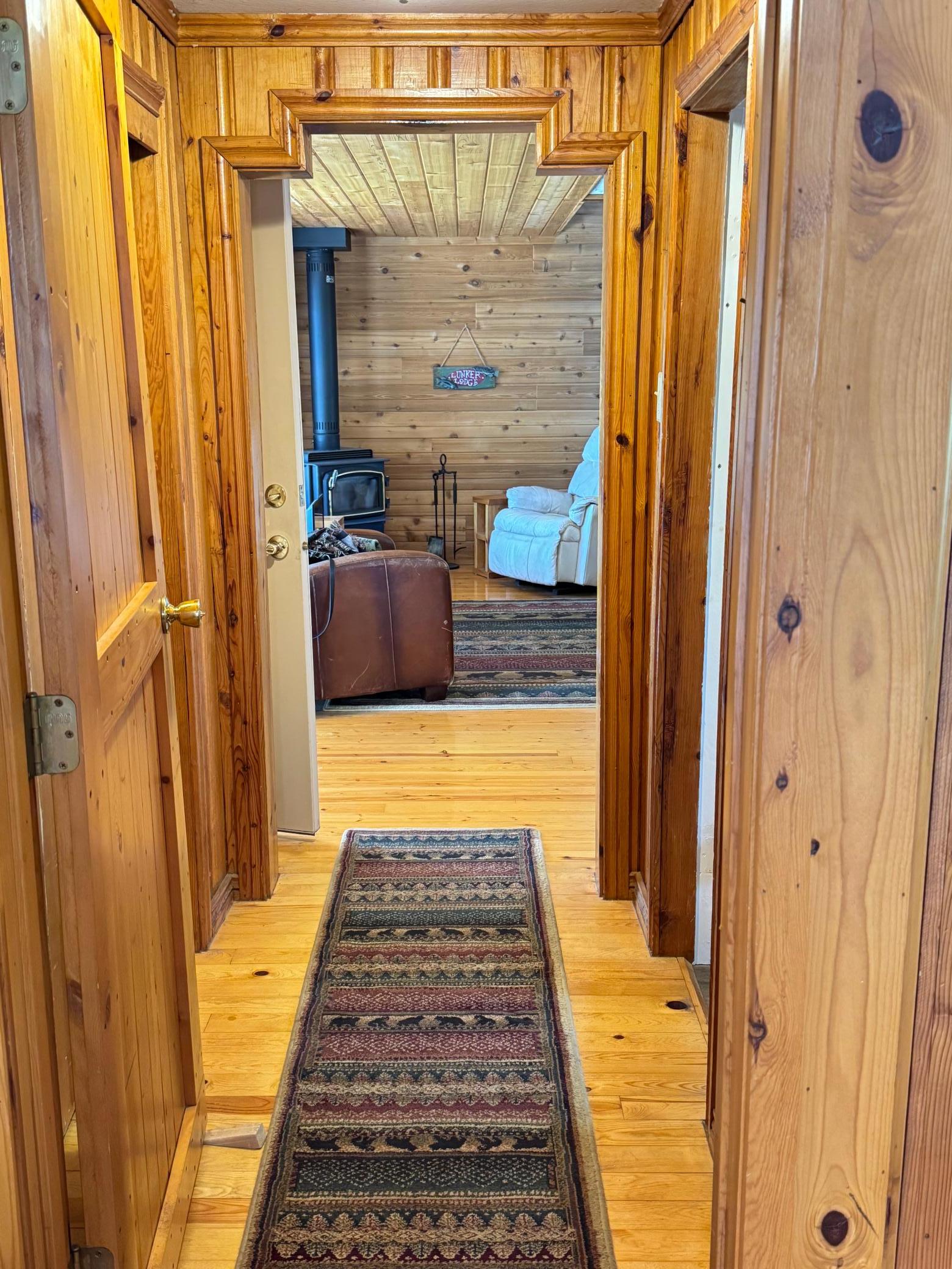 Small hallway that flows between the living room and the main floor bedroom.