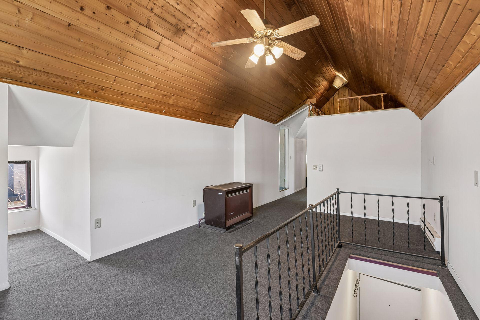 Unit 3 (third floor) features a kitchen, living area, and one bedroom with an adjacent bathroom.