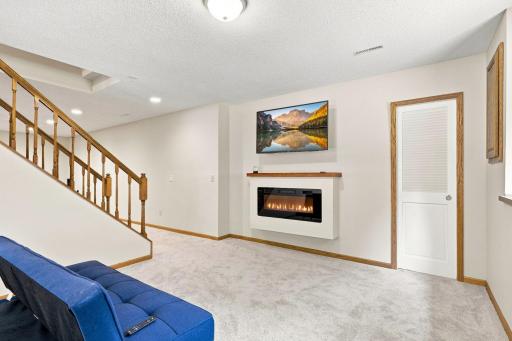 Lower level with second gas burning fireplace