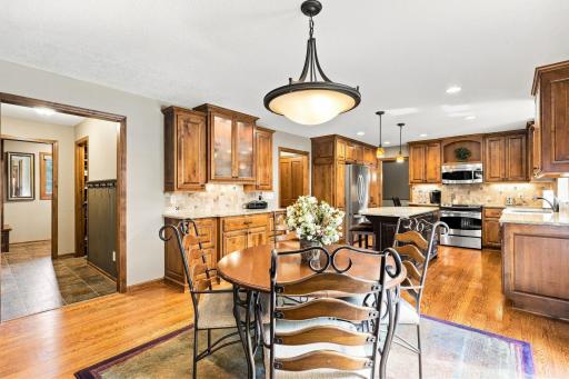 Breakfast nook, kitchen and hall leading to the laundry room and pantry