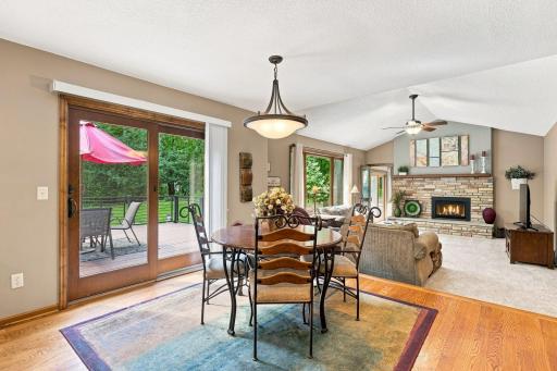 Breakfast nook, maintenance free deck, and family room with door that leads to the sun room