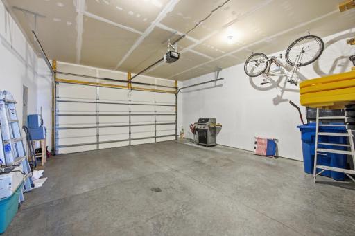 Attached 2-car garage with built-in storage, offering practical space for vehicles, tools, and everyday organization