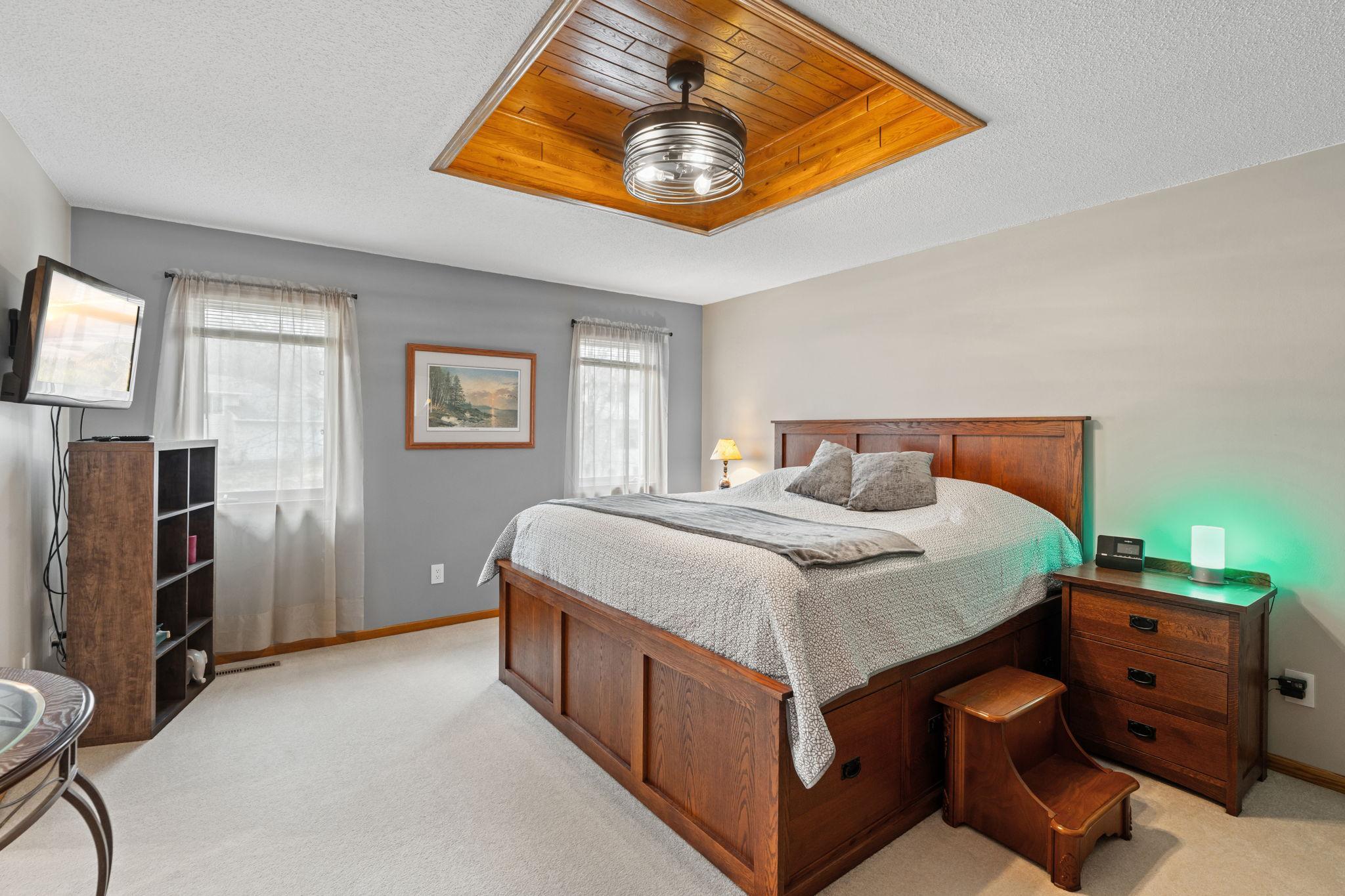 Stunning owners' suite offers a large walk in closet and primary, private bathroom.