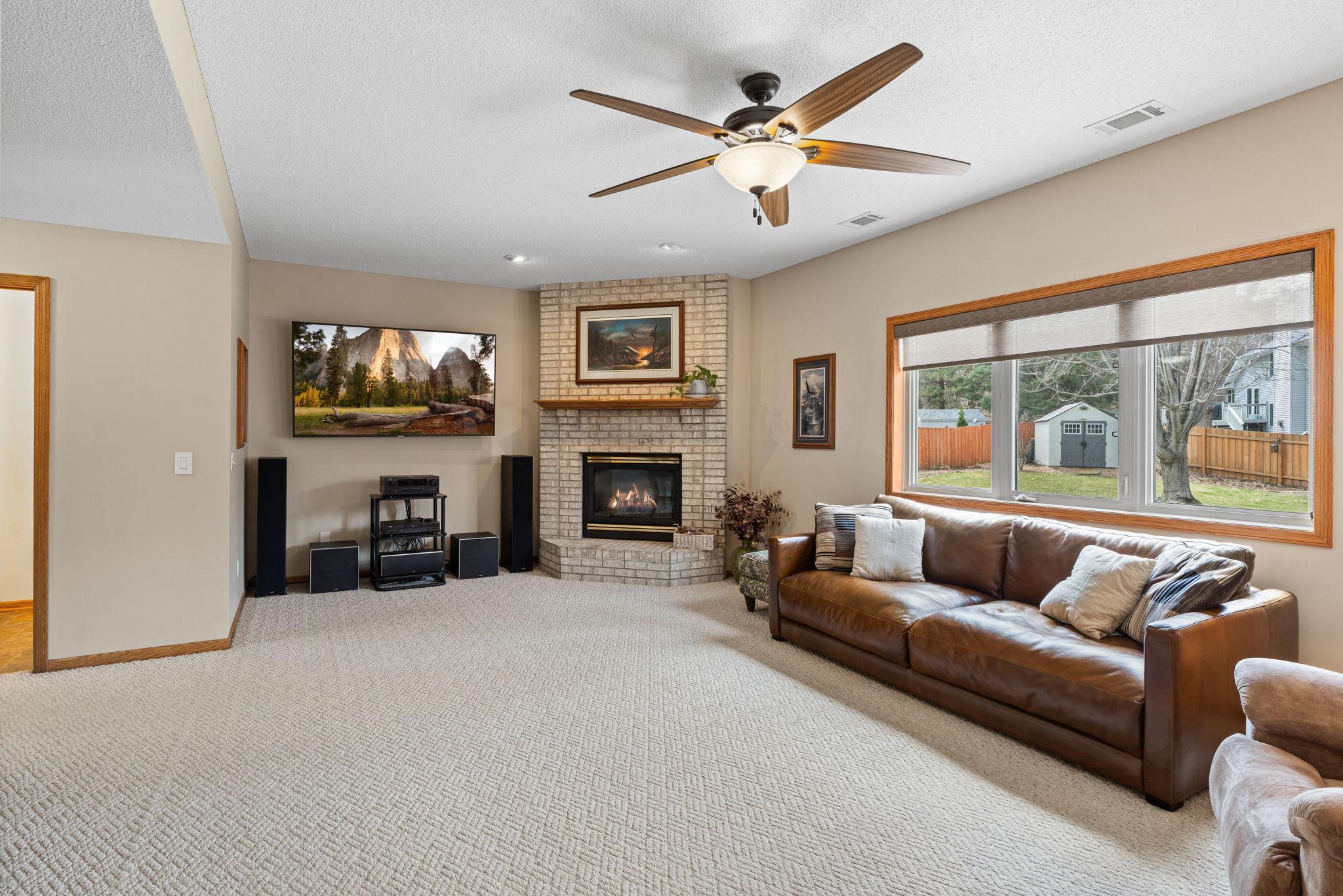 Sunken living room off of the dining area offers a gas fireplace. The switch is on the wall to start it.