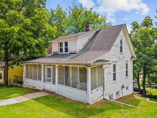 From the front walk to the covered entry, this home offers a genuine sense of place, shaded by mature trees and set on a quiet, storied street.