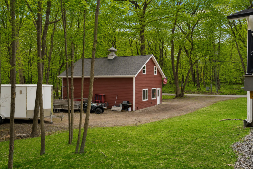 2 garage stall, heated outbuilding, >900 sqft with a 2nd story loft