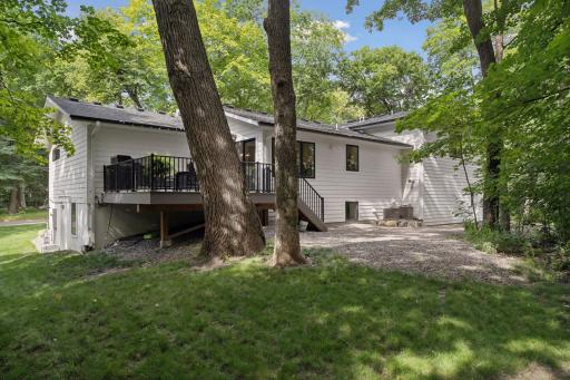 Backyard maintainance free deck & heavy tree coverage!