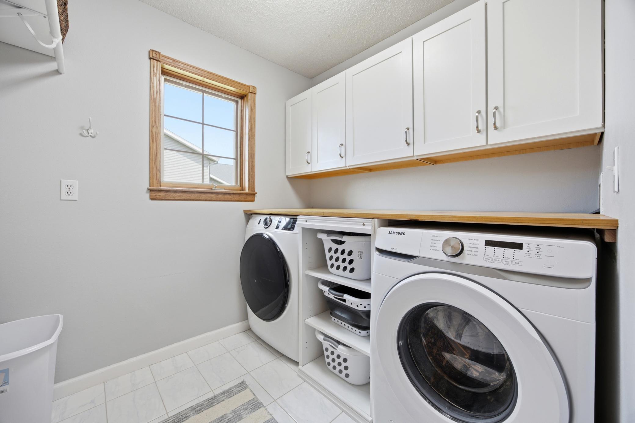 Laundry Room with Cabinets, Counter & Built-In's (Washer & Dryer Included)