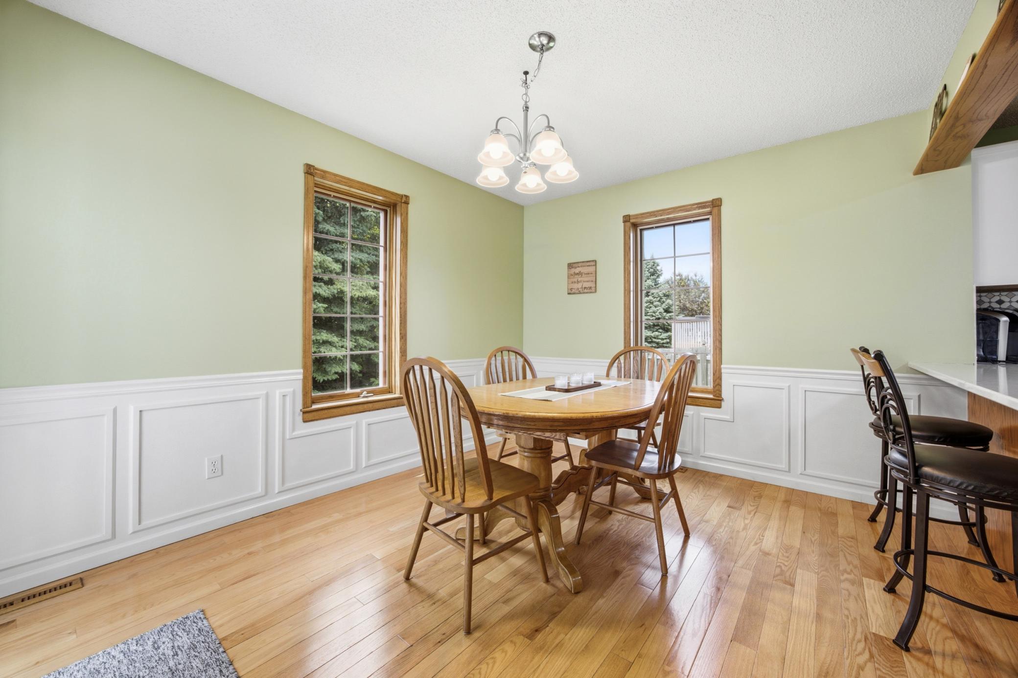Dining with Beautiful Hardwood Floors; Breakfast Area to Kitchen
