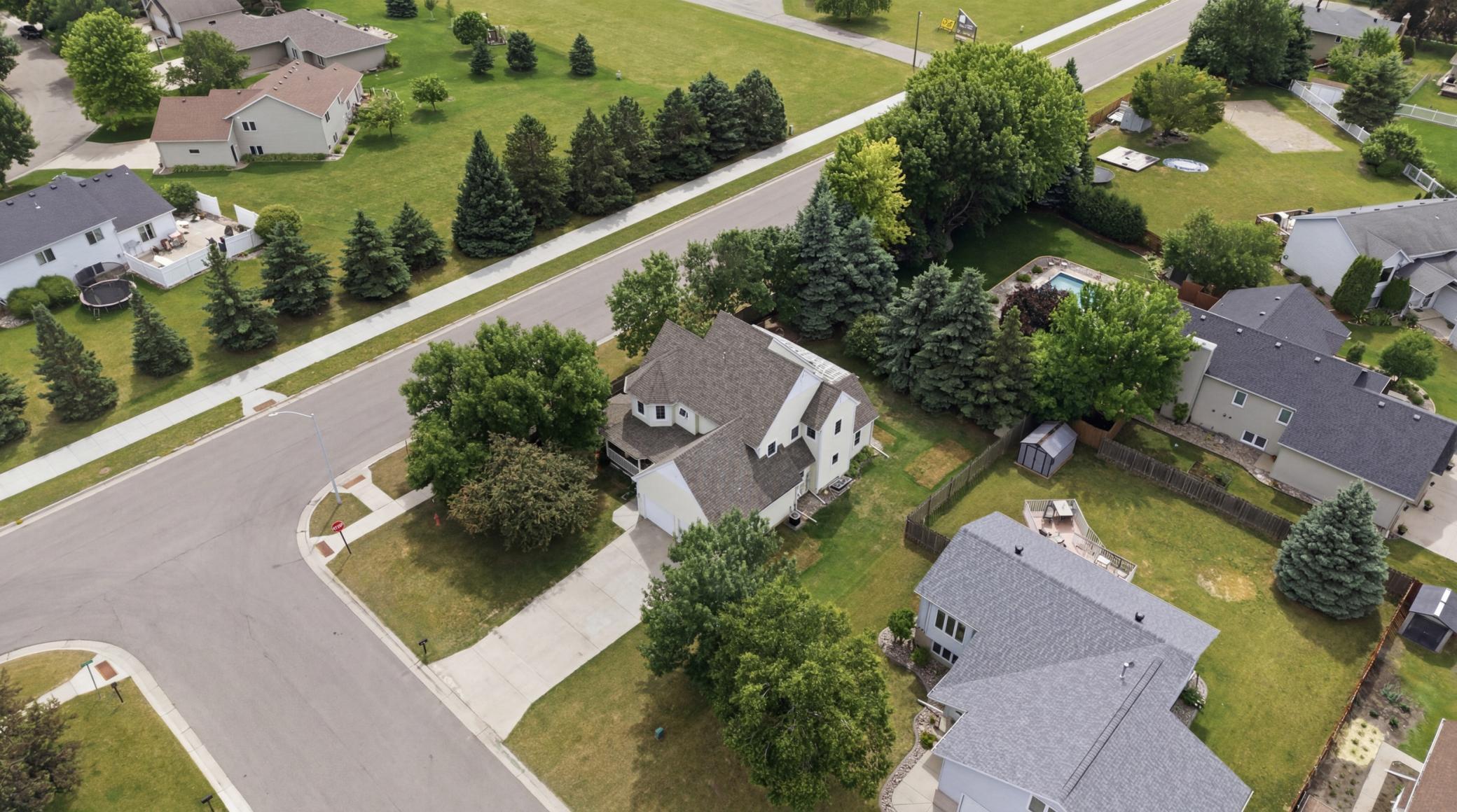Aerial View to Corner Lot with Sidewalks that Surround Area