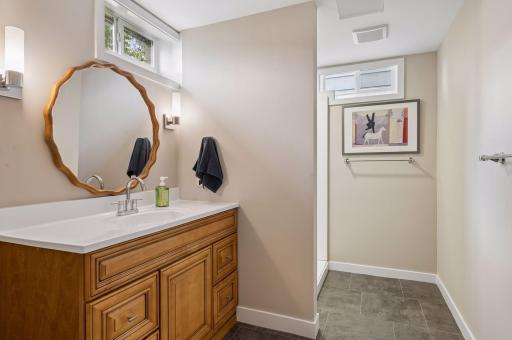 Lower level bathroom is entirely new, huge vanity and beautiful shower