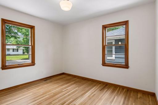 Main floor bedrooms have refinished hardwood floors