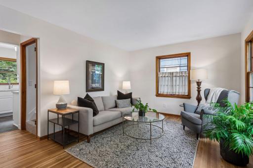 living room features beautifully refinished hardwood floor