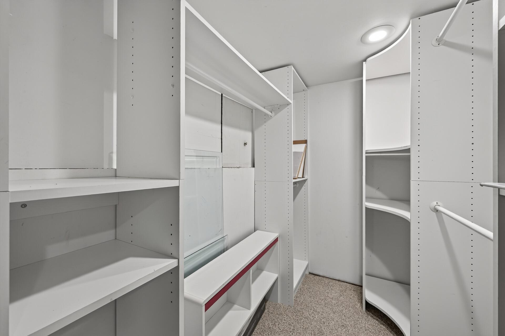 An oversized walk-in storage room keeps everything organized and out of sight.
