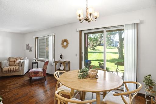 Dining area overlooking the patio and open common grounds