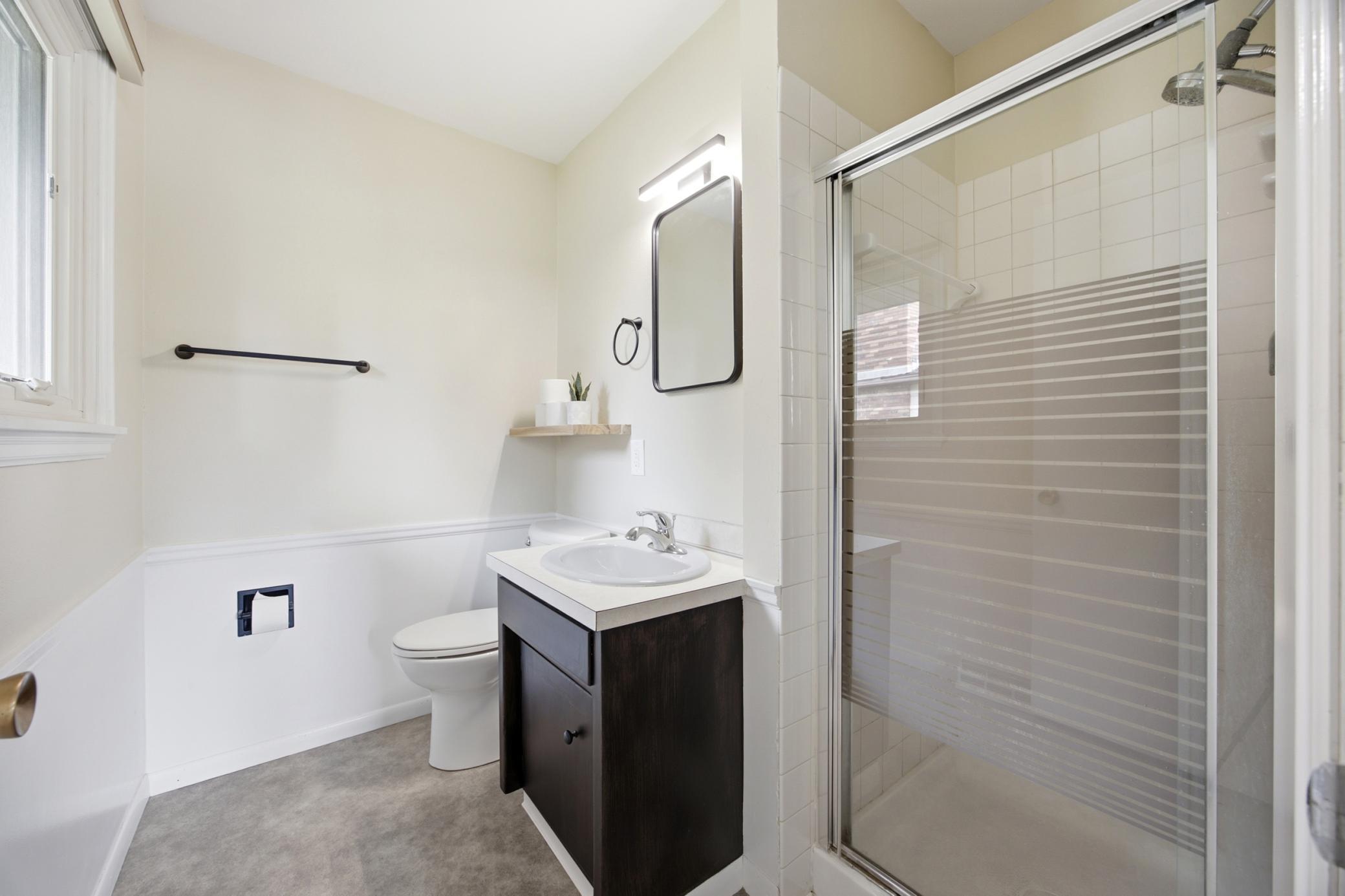 Virtually Staged - Primary Bathroom w/white sink