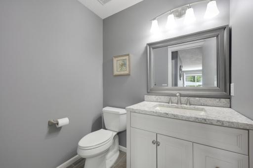 Main floor 1/2 bath with new vanity and top