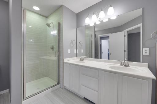 Full bath with updated custom tile shower and flooring
