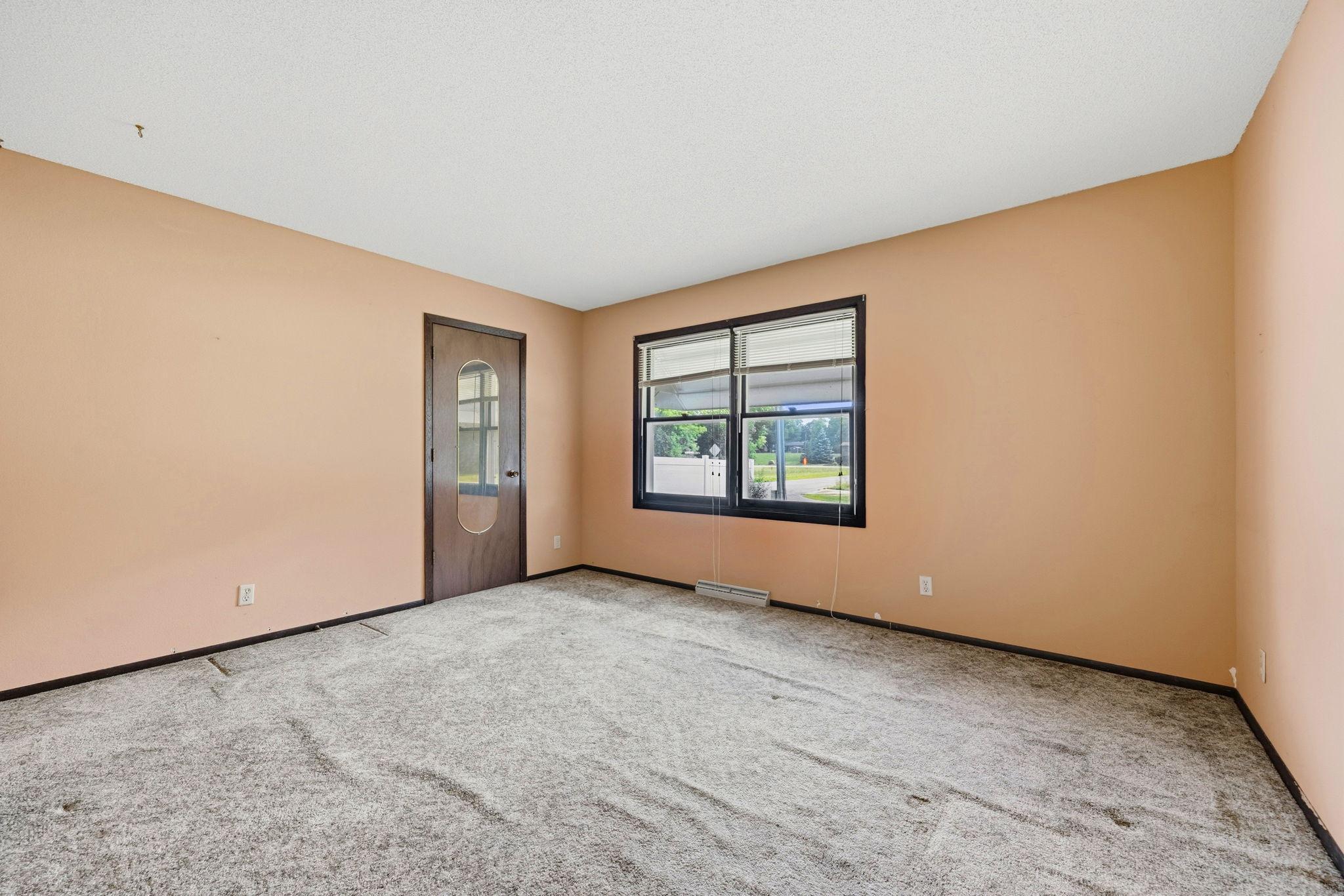 Main bedroom with large closet and easy access to a full bathroom.