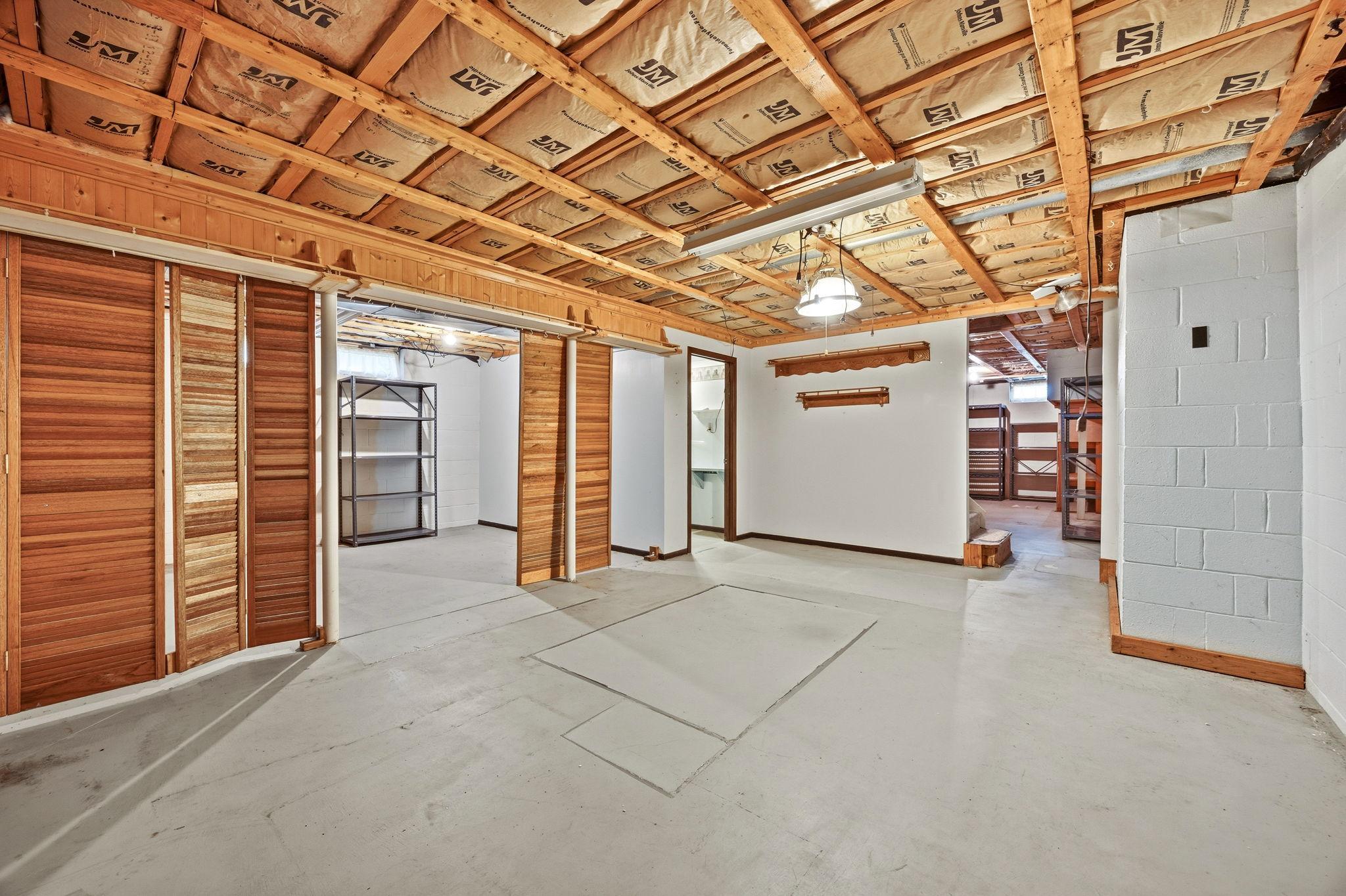 Spacious lower level room perfect for creating your own space.