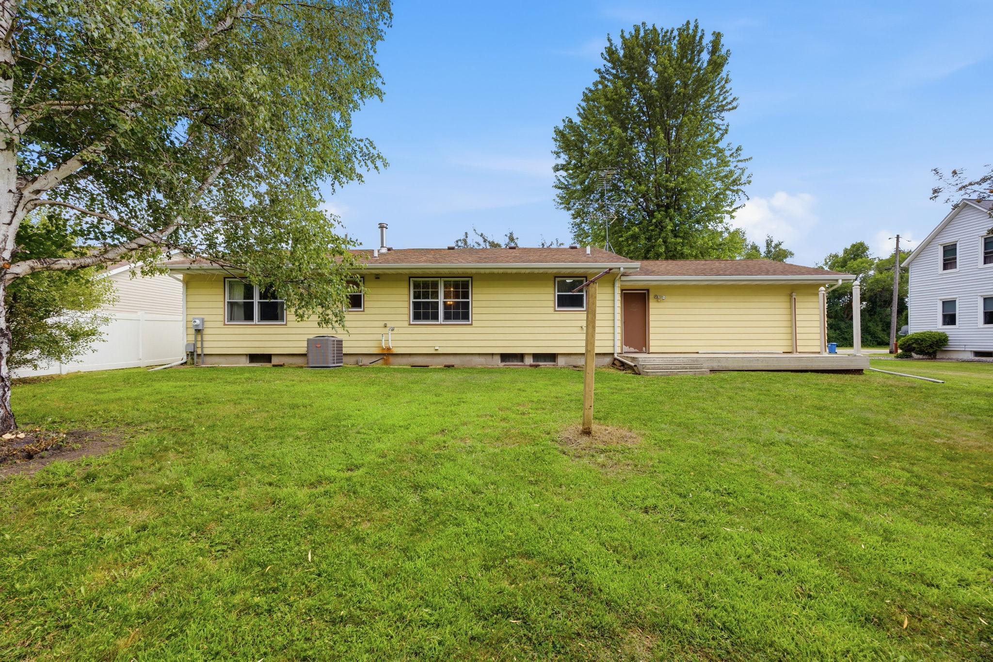 Spacious backyard with plenty of room to relax, entertain, garden, or enjoy outdoor activities.