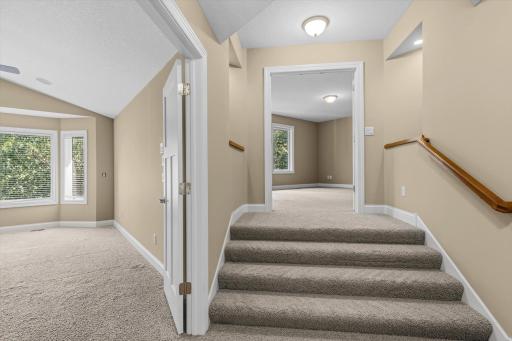 Steps leading to the upper level family room