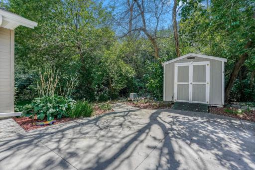 Storage shed just opposite the garage for tools, decorations, etc!