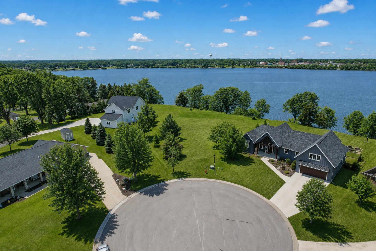 Take in breathtaking western-facing views of the lake and the charming downtown Winsted skyline