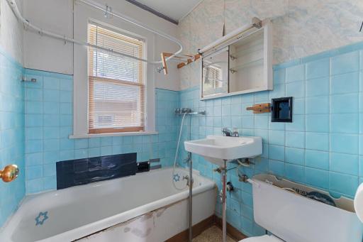 Main floor full bath. New toilet coming soon