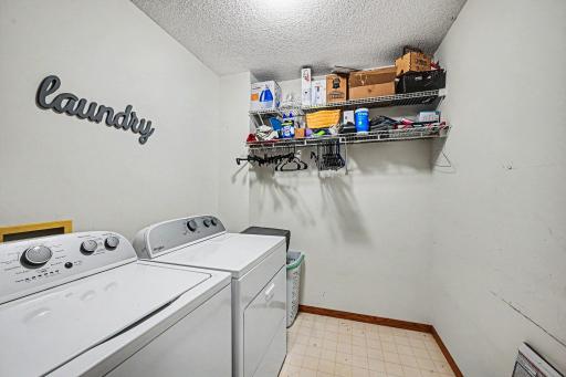 Convenient upper-level laundry room located near both bedroom suites for everyday ease..jpg