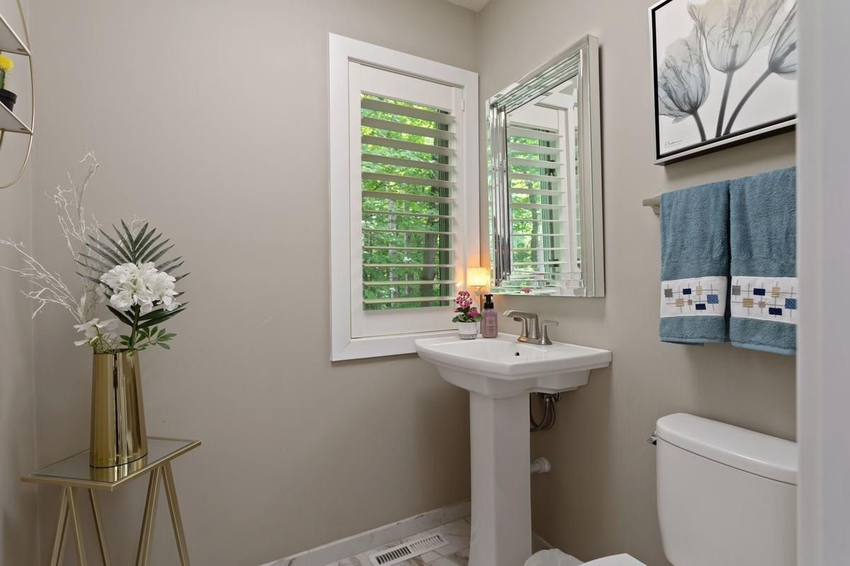 1/2 bath just off the garage on the main level
