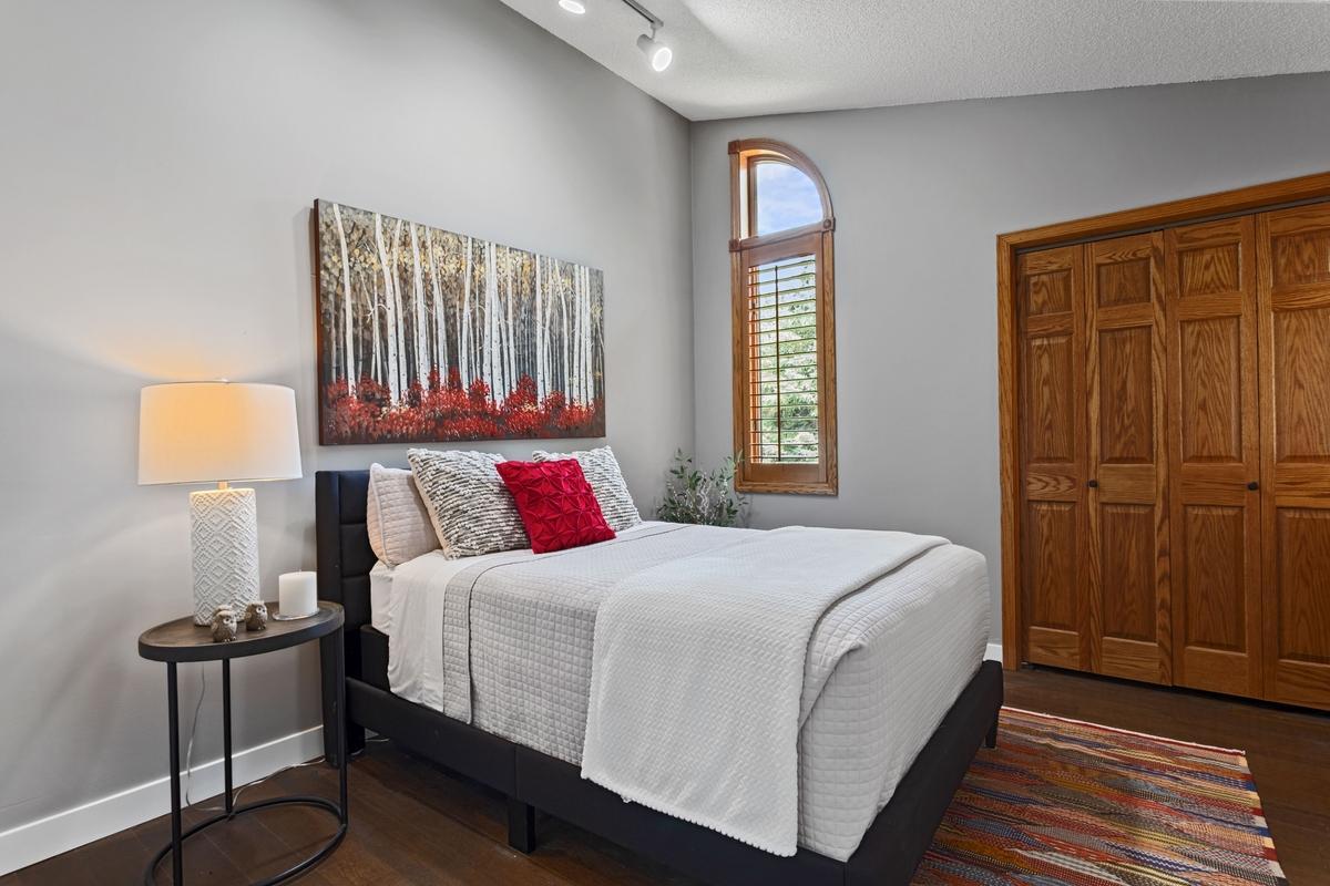 2nd Bedroom on the main level with vaulted ceilings!!