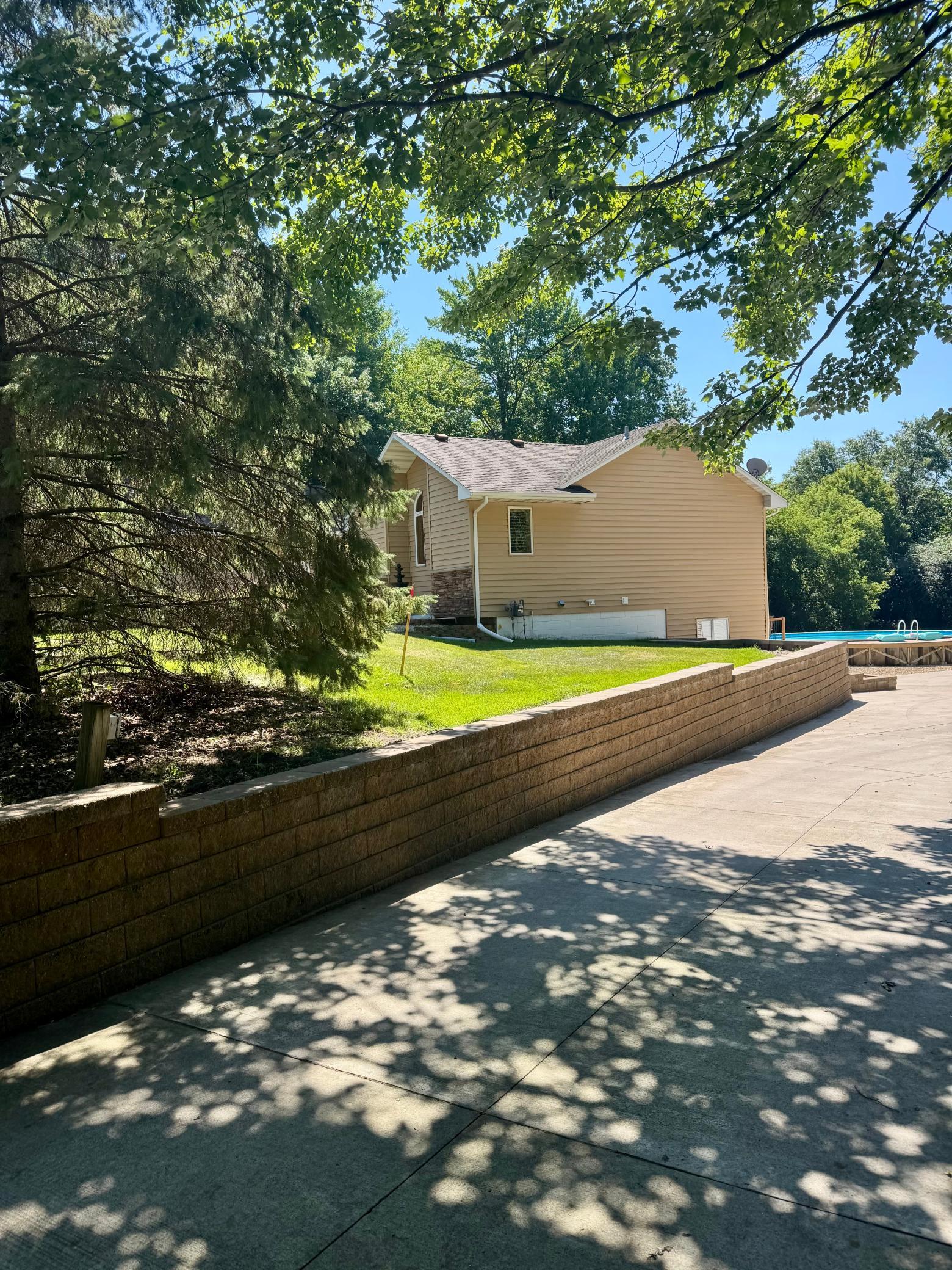 Concrete driveway to the shop