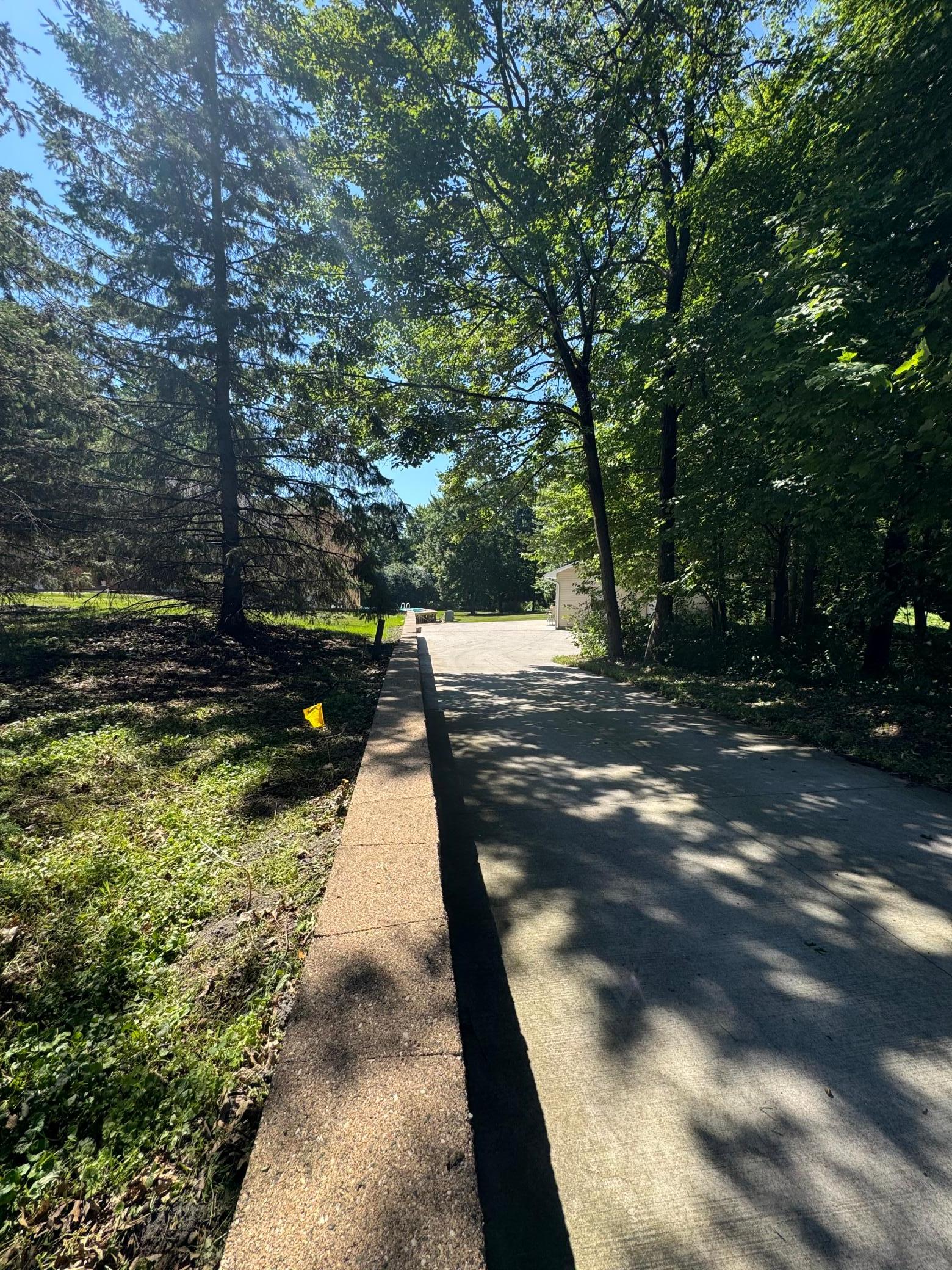 concrete driveway to the shop