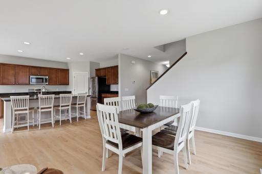 Elegant living spaces flow seamlessly throughout the main level.
