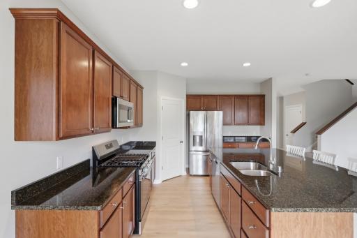 Stylish kitchen with abundant cabinetry and workspace.